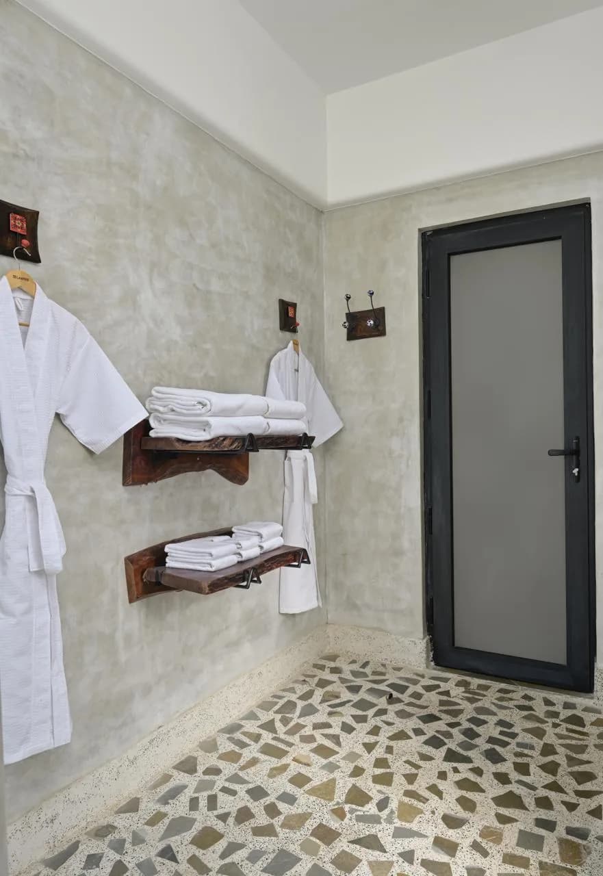 Ensuite luxury bathroom with plush bathrobes and shower